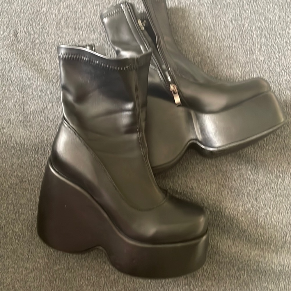 Black Wedge Platform ankle boots.